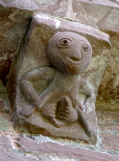 A 'Sheela na Gig' - compare her to the images of 'Coventina' from the Romano-British stelae...