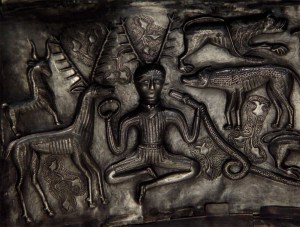 The 'visionary' man holding a torc and serpent (Gundestrup cauldron - late Celtic iron age). Compare this image to the Delphian tetradrachm above...